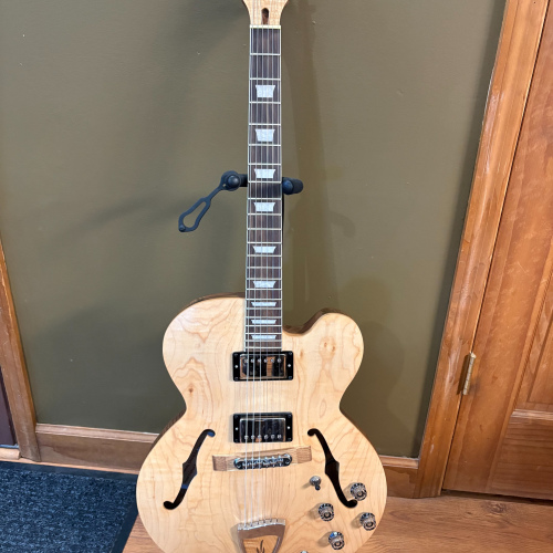 Coridella Custom Maple and Butternut Carved Top Guitar